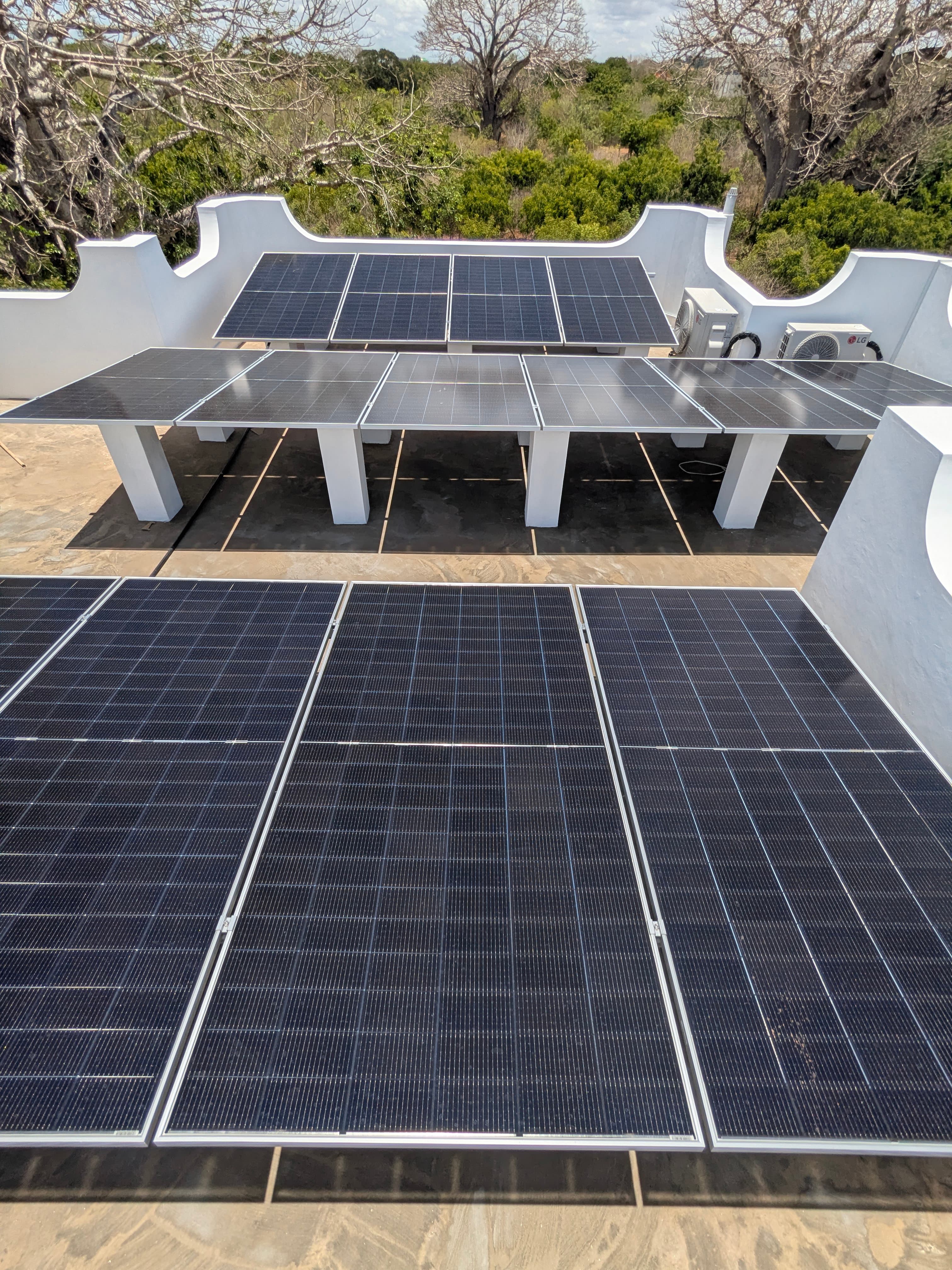 Multiple solar panel arrays on rooftop