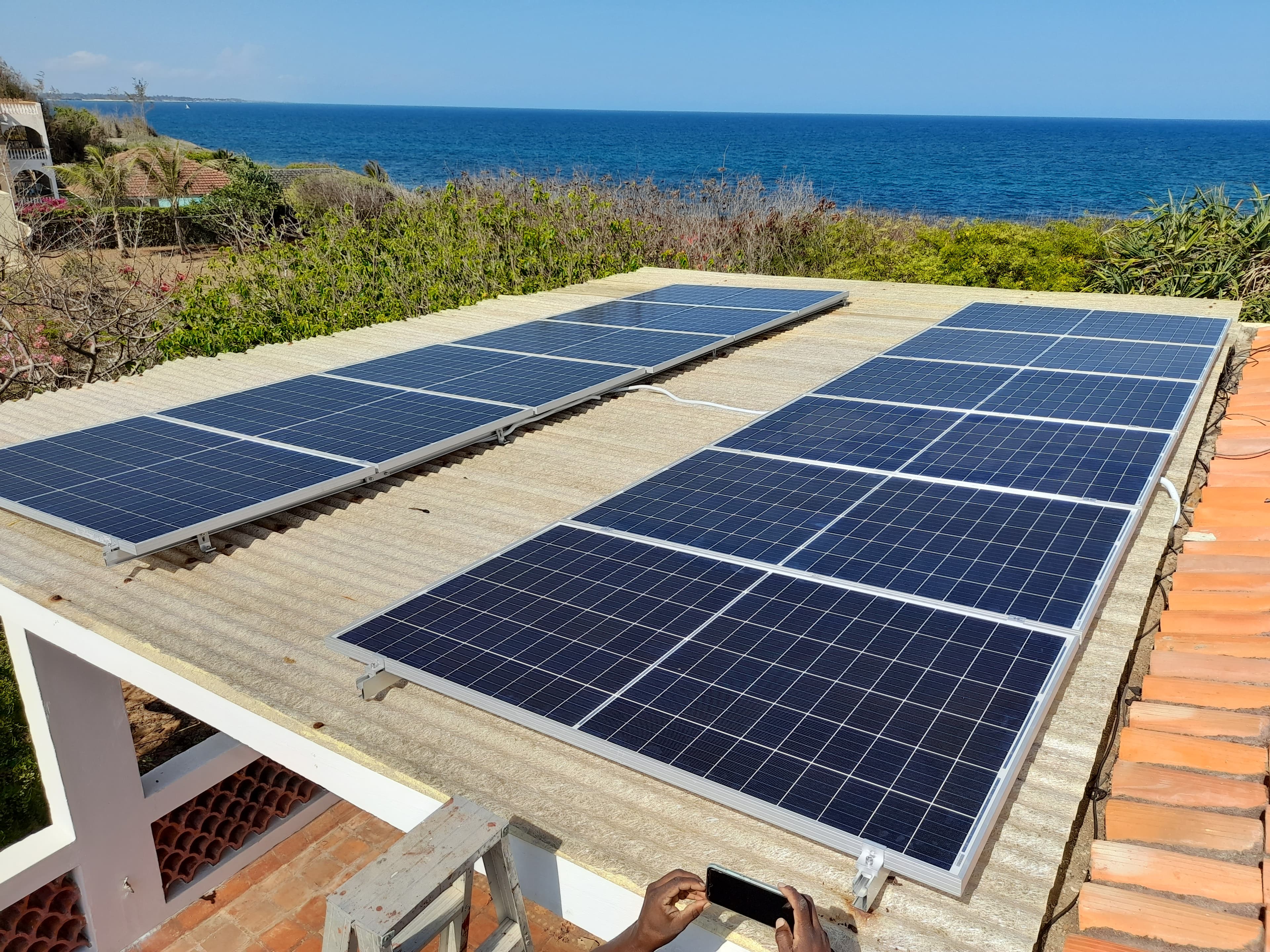 Rooftop solar array overlooking the coast